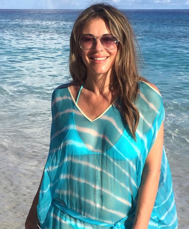 Elizabeth Jane Hurley Showing Off In Sexy Bikini And Topless As Well